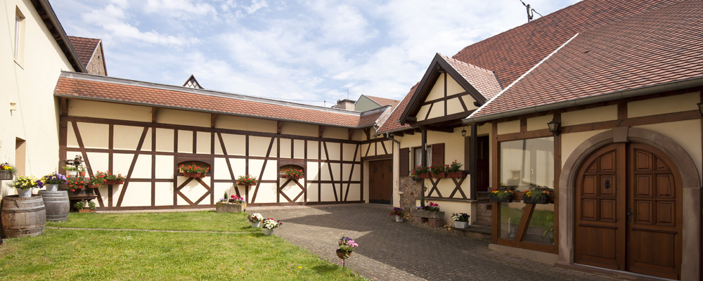 Het vakwerkhuis van Domaine Joseph Scharsch in de Elzas